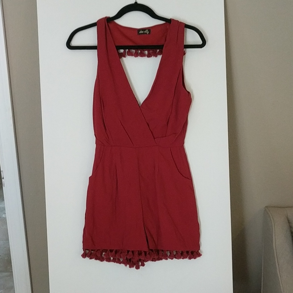 Pom pom burnt orange romper. By dee elly